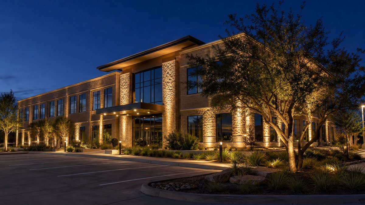 Commercial building in Fort Worth with outdoor LED facade and site lighting at dusk
