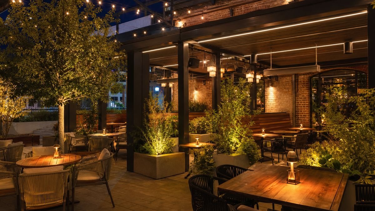 Fort Worth restaurant patio with warm outdoor LED lighting in the evening